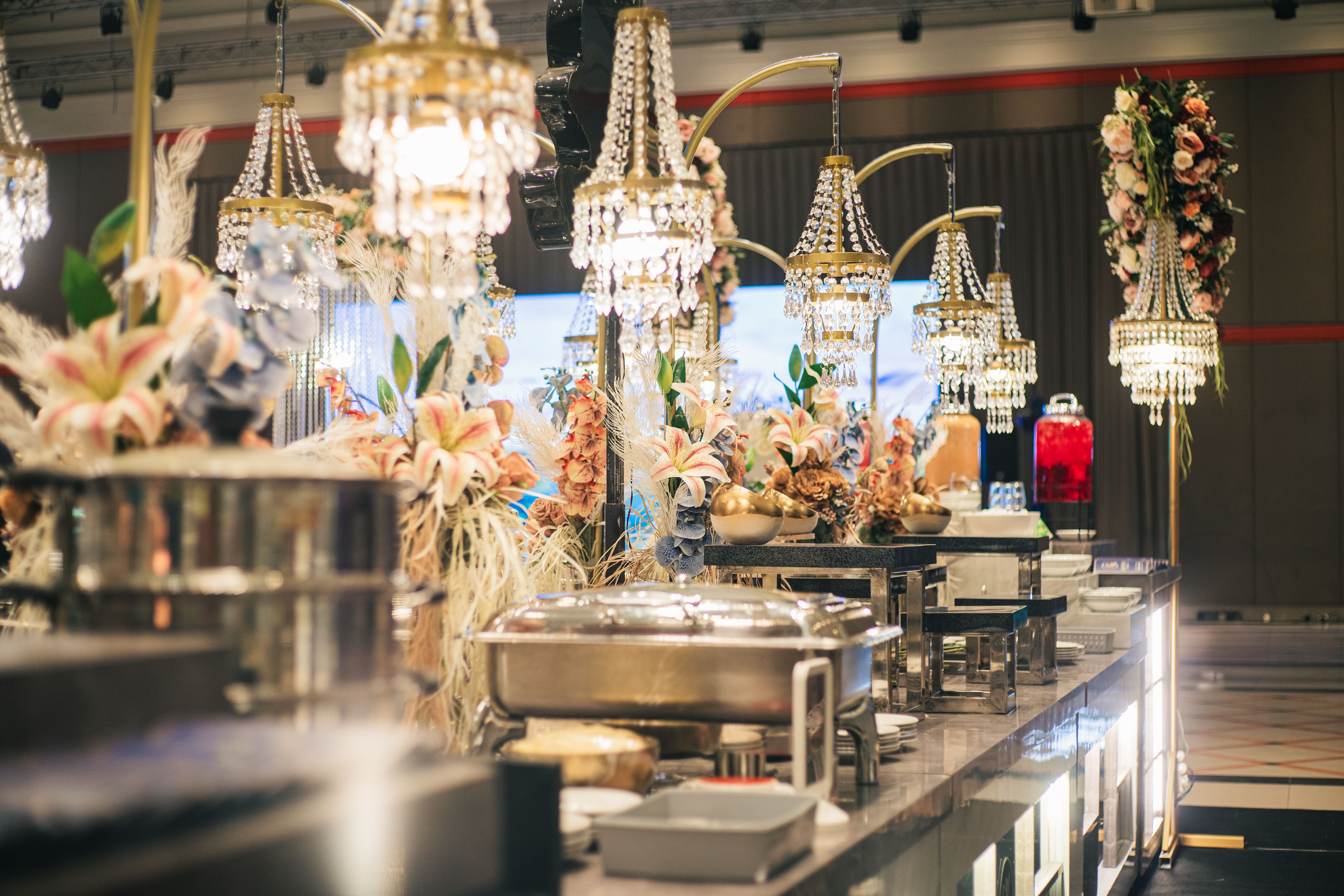 Chandelier-lit banquet buffet line for Houston event catering